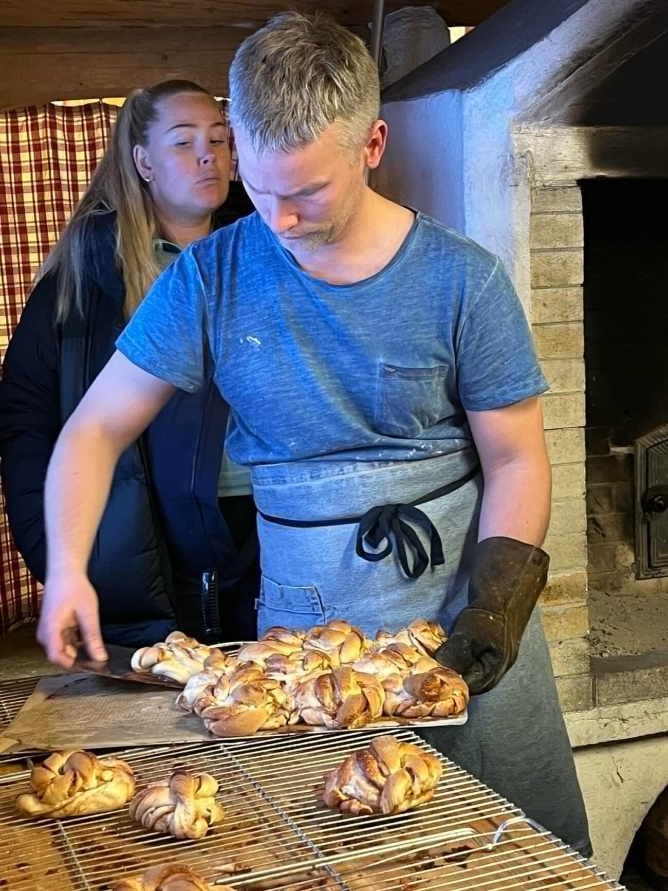 Hot-from-the-oven home-baked cinnamon rolls getting eyeballed at the Christmas Market on campus in Rauland, Norway.