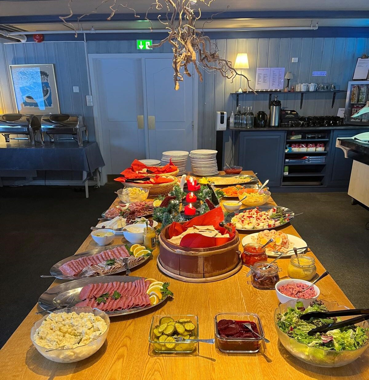 Table filled with traditional Norwegian holiday appetizers.