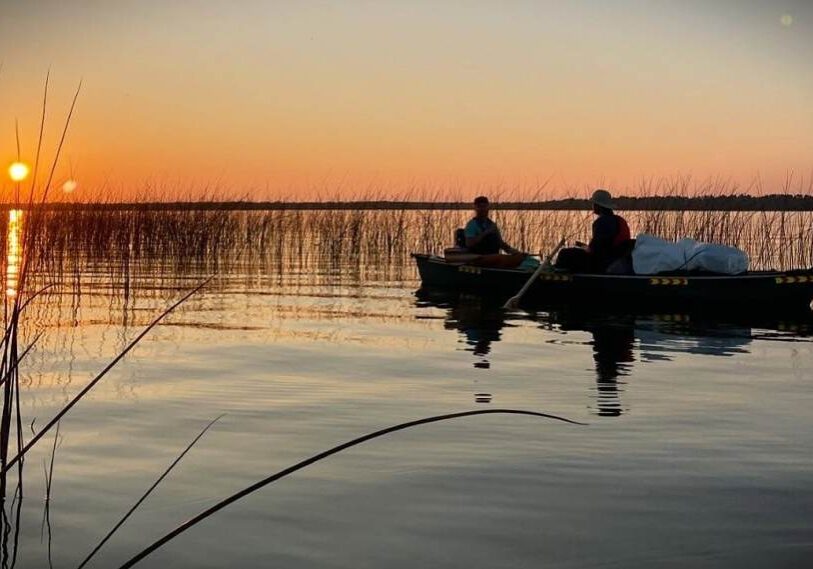 photo of sunset across body of water