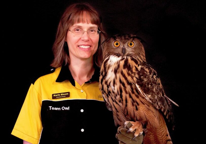 Karla Bloem, Executive Director of the International Owl Center in Houston, Minnesota, with Uhu the Eurasian Eagle Owl. (Photo by Alan Stankevitz) Karla Bloem, Executive Director of the International Owl Center in Houston, Minnesota, with Uhu the Eurasian Eagle Owl. (Photo by Alan Stankevitz)