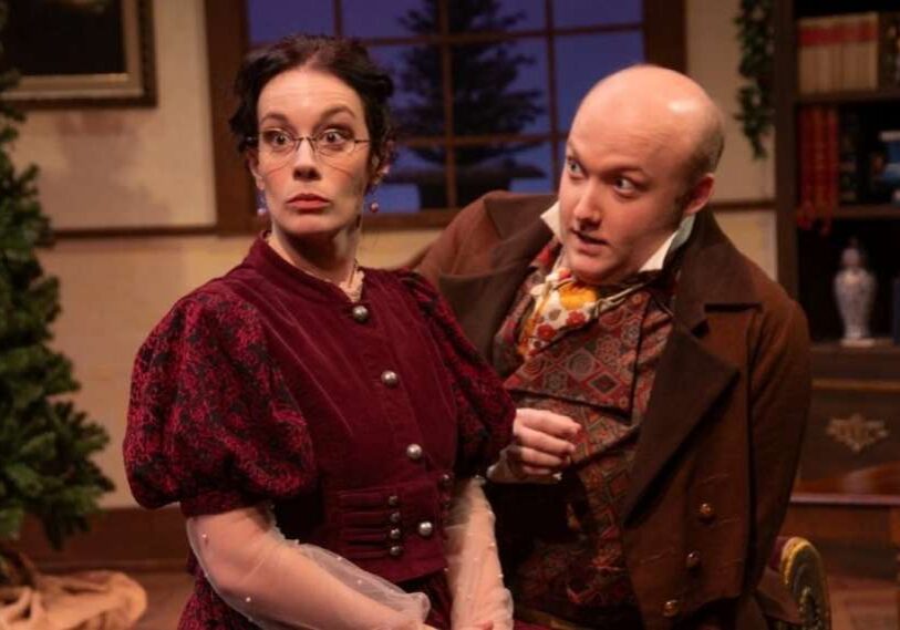 woman and man on stage during theater production