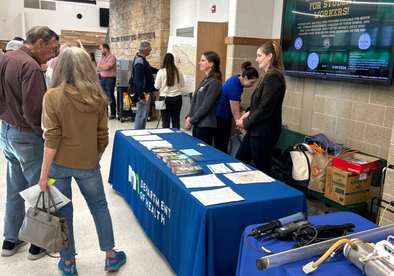PHOTO 1 H MDH <span style="font-size: 14px; color: #6c6b6b; ">Staff with the Minnesota Department of Health welcomed well owners to a nitrate open house June 26th in Rushford. (Photo by John Torgrimson)</span>