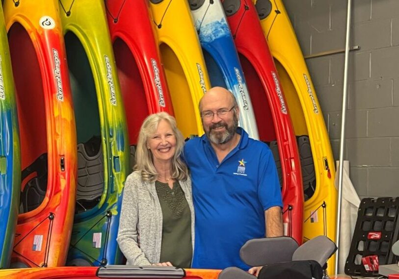 Karen and Kevin Carr in their Chosen Valley Canoe Accessories shop in Chatfield.(Photo by Laurie Byrne) 