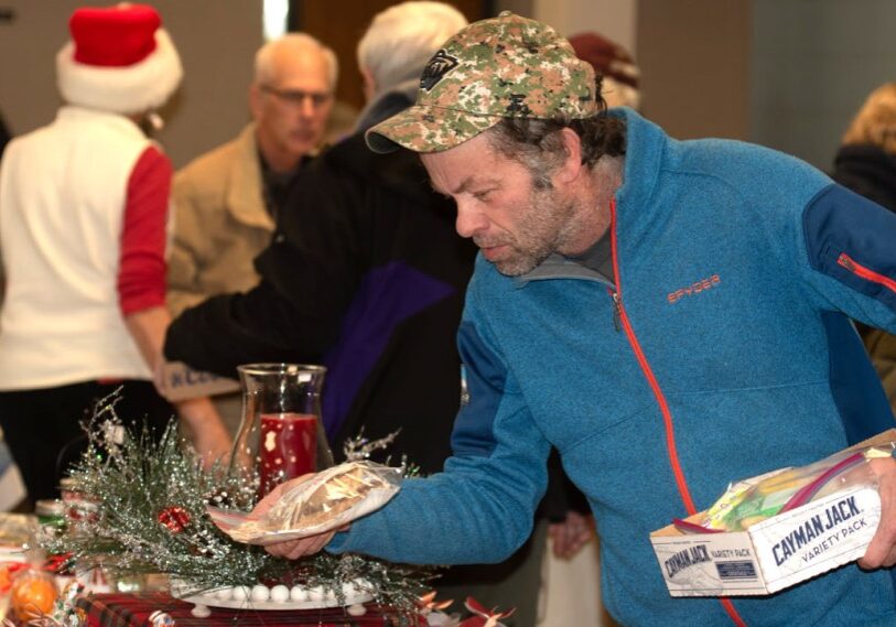 PHOTO 1 Pederson Jeremy Pederson looks for baked goods to buy at the 2023 Christ Lutheran Church Craft Fair & Bake Sale in Preston. (Photos by John Weiss)