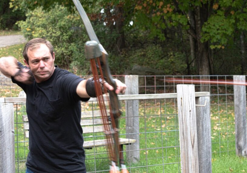 Lee Whipkey of Rushford releases a wooden arrow when practicing at an archery range in Houston.  (Photos by John Weiss)