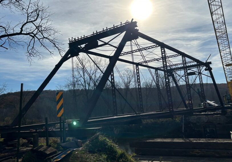 PHOTO 1 Wide shot The Historic Forestville bridge, built in 1899, before it was hoisted off its abutments and placed on the south side of the Root River. (Photo by John Torgrimson)