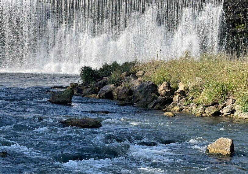 Water flows over the Lanesboro dam along its autumn journey to the Mississippi River.
