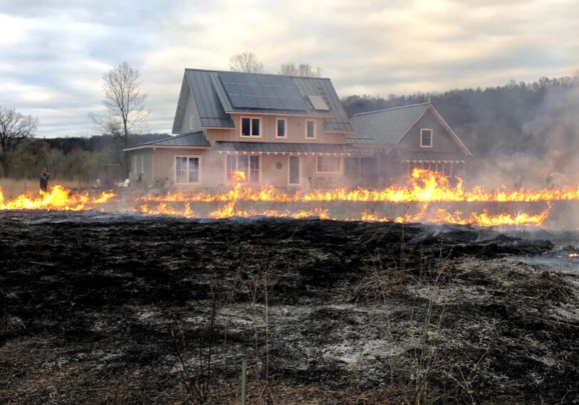 Prairie enthusiasts throughout the Root River valley burn off remains of previous years' prairie grasses to trigger another year’s new growth. (Photo by John Gaddo)