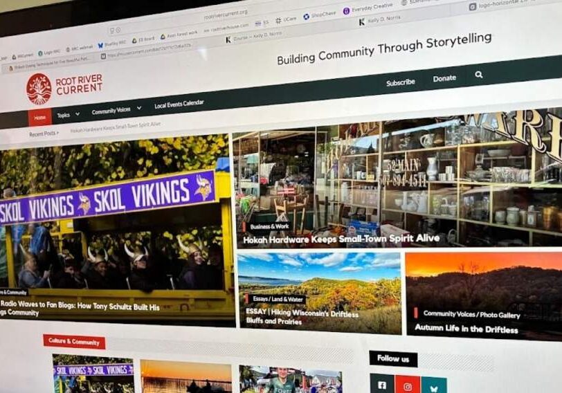 photo of a laptop with view of Root River Current homepage